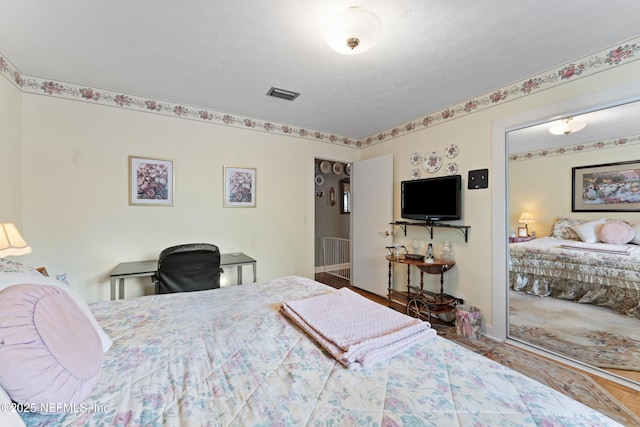 2364 Smullian Trl S, Jacksonville, FL 32217 - bedroom featuring baseboards and wood finished floors