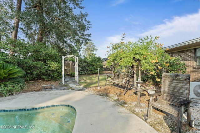 2364 Smullian Trl S, Jacksonville, FL 32217 - outdoor pool featuring a cooling unit and a patio area