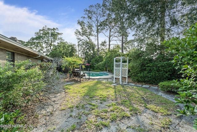 2364 Smullian Trl S, Jacksonville, FL 32217 - view of yard with an outdoor pool