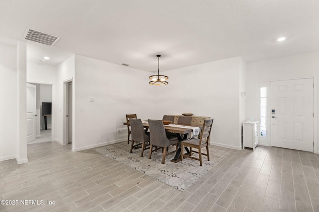 85600 Stonehurst Pkwy, Fernandina Beach, FL 32034 - dining space with light wood-style floors, baseboards, and recessed lighting