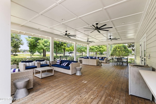 85600 Stonehurst Pkwy, Fernandina Beach, FL 32034 - wooden terrace with an outdoor living space and ceiling fan