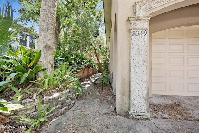2049 Seminole Rd, Atlantic Beach, FL 32233 - view of exterior entry featuring a garage
