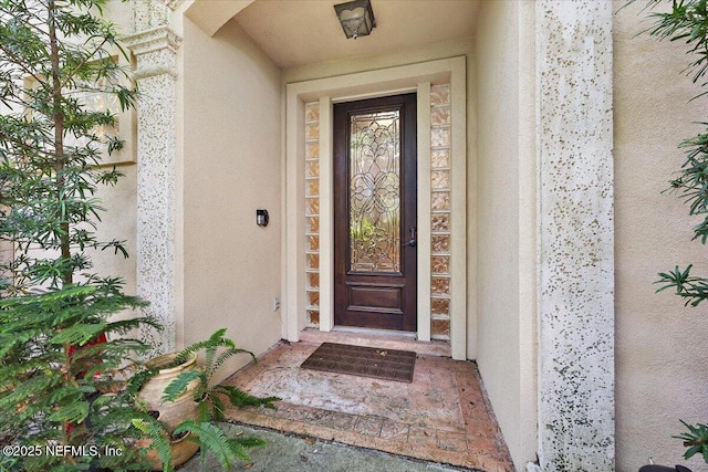 2049 Seminole Rd, Atlantic Beach, FL 32233 - doorway to property featuring stucco siding