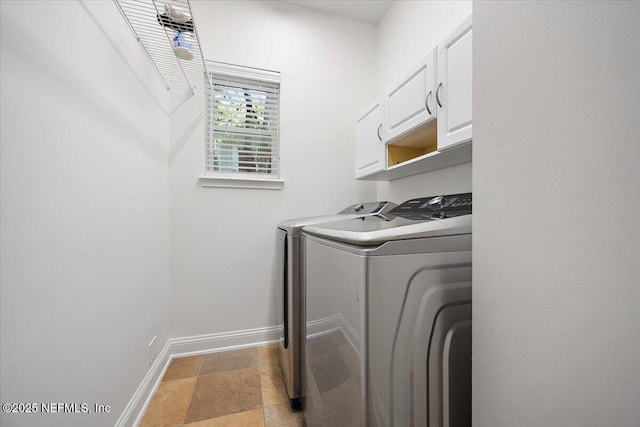 2049 Seminole Rd, Atlantic Beach, FL 32233 - laundry area featuring washer and dryer and cabinet space