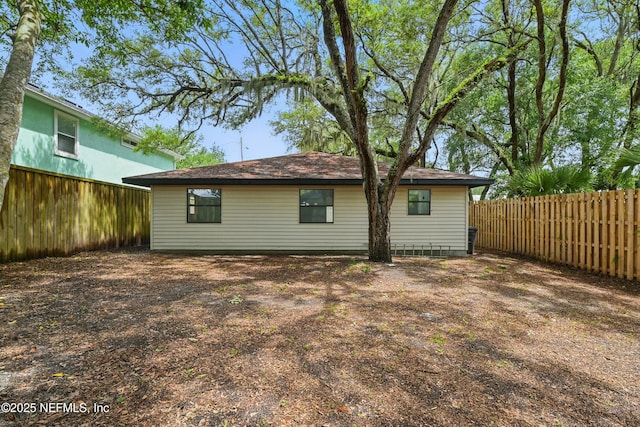 494 Acacia St, Saint Augustine Beach, FL 32080 - back of house featuring a fenced backyard