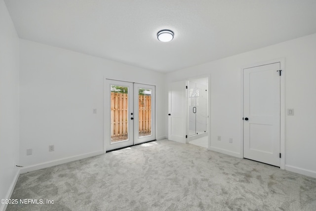 494 Acacia St, Saint Augustine Beach, FL 32080 - unfurnished bedroom with carpet floors, access to exterior, and baseboards