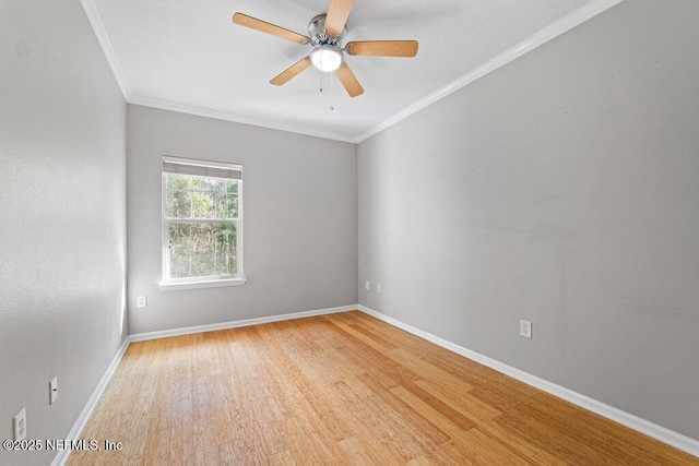 5006 Key Lime Dr Unit 306, Jacksonville, FL 32256 - empty room with wood finished floors, a ceiling fan, crown molding, and baseboards