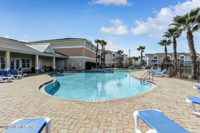 5006 Key Lime Dr Unit 306, Jacksonville, FL 32256 - community pool with a patio and a residential view
