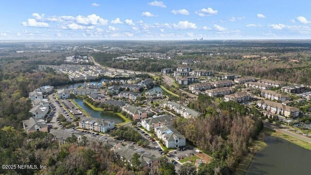 5006 Key Lime Dr Unit 306, Jacksonville, FL 32256 - aerial view of property's location featuring a nearby body of water and a heavily wooded area