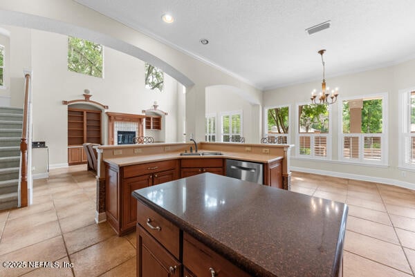 1821 Wind Ridge Ct, Fleming Island, FL 32003 - kitchen featuring a large island with sink, dishwasher, healthy amount of natural light, and recessed lighting