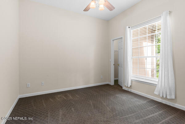 1821 Wind Ridge Ct, Fleming Island, FL 32003 - carpeted empty room featuring ceiling fan and baseboards