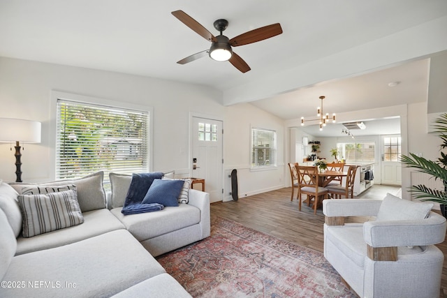 541 Margaret St, Neptune Beach, FL 32266 - living area featuring light wood-style flooring, a chandelier, ceiling fan, and baseboards