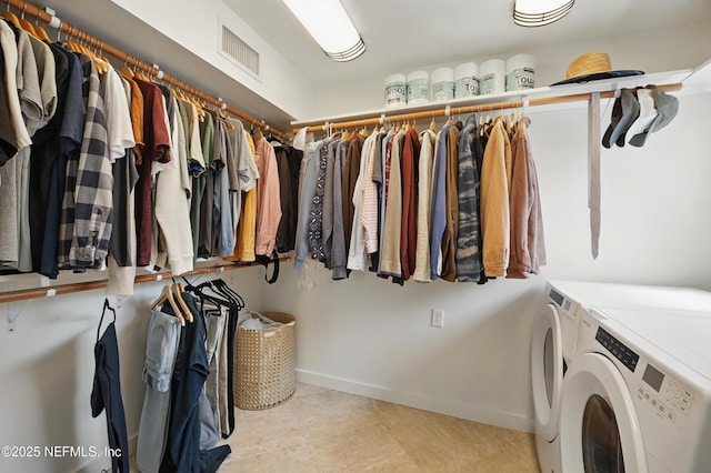 541 Margaret St, Neptune Beach, FL 32266 - spacious closet featuring separate washer and dryer and light tile patterned floors