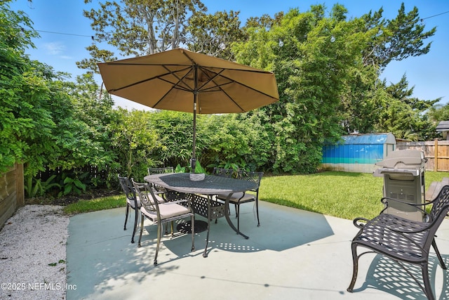 541 Margaret St, Neptune Beach, FL 32266 - view of patio featuring outdoor dining space and area for grilling