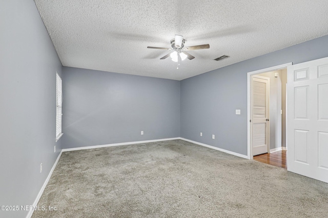 1645 Teaberry Dr, Middleburg, FL 32068 - spare room with a ceiling fan, carpet, and a textured ceiling