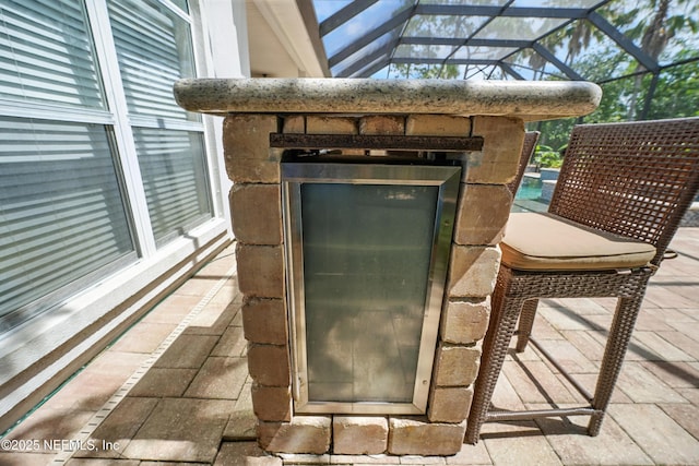 4427 Royal Tern Ct, Jacksonville Beach, FL 32250 - view of patio / terrace featuring glass enclosure