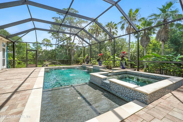 4427 Royal Tern Ct, Jacksonville Beach, FL 32250 - view of swimming pool with a patio area, a pool with connected hot tub, and a lanai