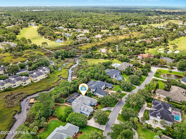 4427 Royal Tern Ct, Jacksonville Beach, FL 32250 - aerial overview of property's location with nearby suburban area and a golf club