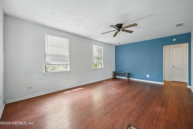 1176 Dancy St, Jacksonville, FL 32205 - spare room featuring a ceiling fan, baseboards, and wood finished floors