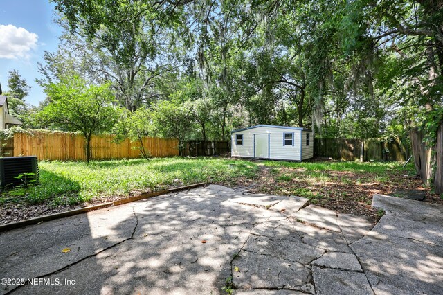 1176 Dancy St, Jacksonville, FL 32205 - fenced backyard with a patio and central air condition unit