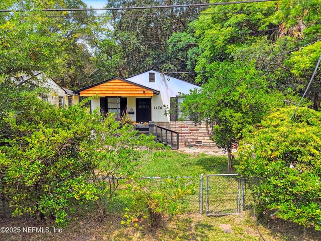 1176 Dancy St, Jacksonville, FL 32205 - bungalow-style house featuring a gate