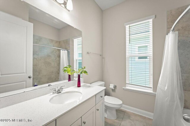 286 Holly Landing Way, Saint Augustine, FL 32092 - bathroom with plenty of natural light, vanity, a shower with curtain, and toilet