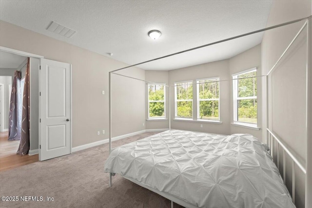 286 Holly Landing Way, Saint Augustine, FL 32092 - bedroom featuring multiple windows, carpet, and baseboards