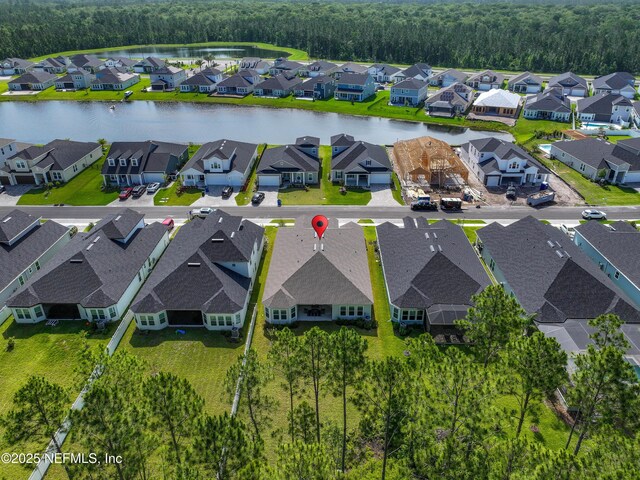 286 Holly Landing Way, Saint Augustine, FL 32092 - aerial view of residential area with a large body of water and a heavily wooded area