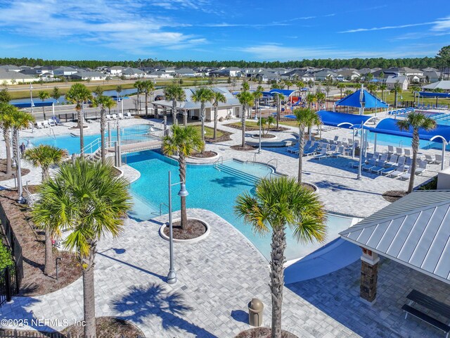 286 Holly Landing Way, Saint Augustine, FL 32092 - community pool featuring a water slide and a residential view