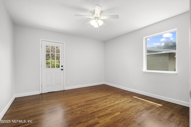 3121 Holly Berry Ln, Jacksonville, FL 32277 - empty room featuring wood finished floors and ceiling fan