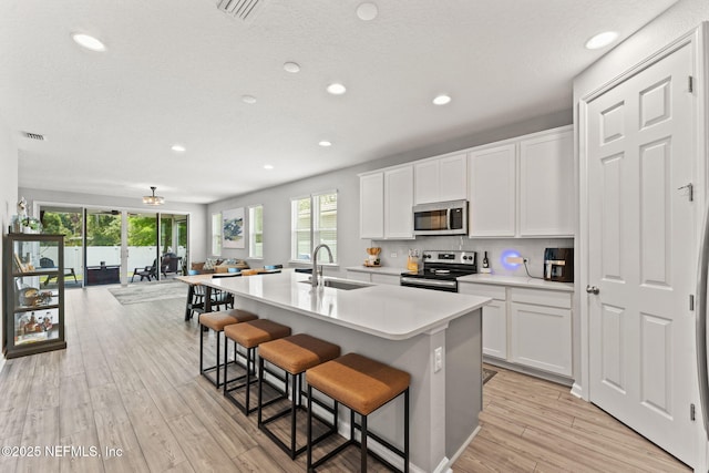 3430 Traceland Oak Ln, Green Cove Springs, FL 32043 - kitchen with appliances with stainless steel finishes, a sink, recessed lighting, light countertops, and tasteful backsplash