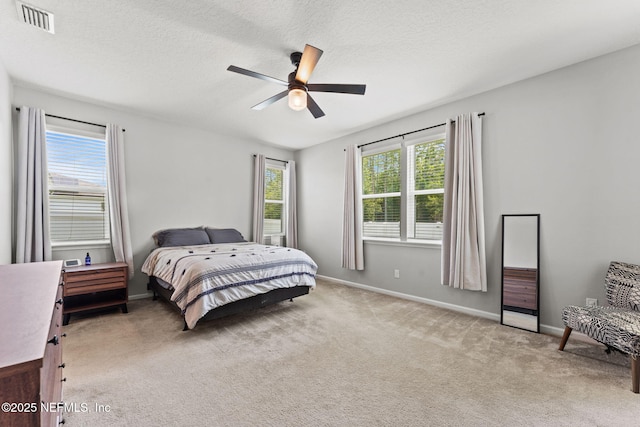 3430 Traceland Oak Ln, Green Cove Springs, FL 32043 - carpeted bedroom with baseboards, ceiling fan, and a textured ceiling