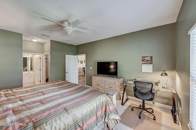112 Laurel Wood Way Unit 202, Saint Augustine, FL 32086 - bedroom featuring a desk, ceiling fan, and connected bathroom