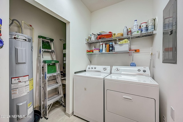 112 Laurel Wood Way Unit 202, Saint Augustine, FL 32086 - laundry area featuring electric water heater, washer and dryer, electric panel, and light tile patterned floors