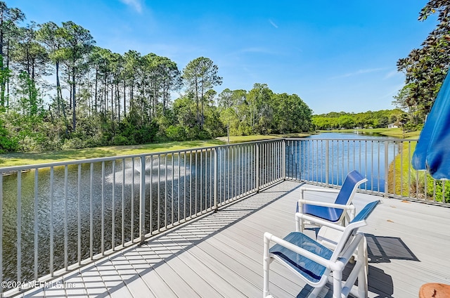 112 Laurel Wood Way Unit 202, Saint Augustine, FL 32086 - deck with a water view and view of scattered trees