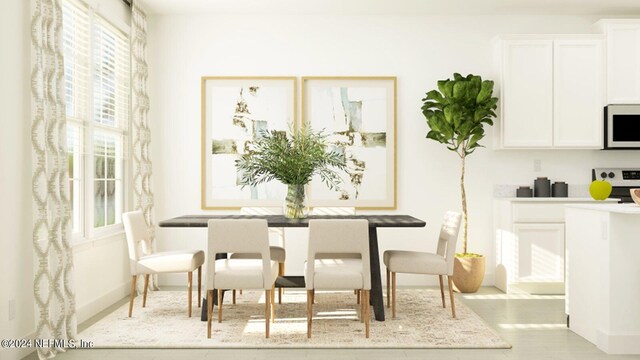 28 Hogan Ct, Saint Augustine, FL 32092 - dining area featuring baseboards