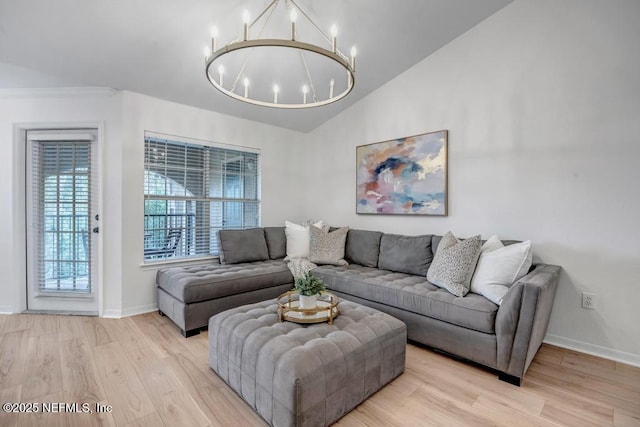 10961 Burnt Mill Rd Unit 1534, Jacksonville, FL 32256 - living area with wood finished floors, a chandelier, baseboards, and high vaulted ceiling