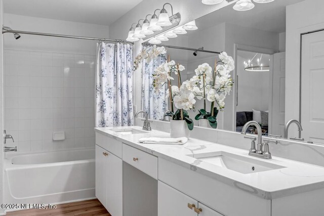 10961 Burnt Mill Rd Unit 1534, Jacksonville, FL 32256 - full bathroom with shower / tub combo, double vanity, and wood finished floors