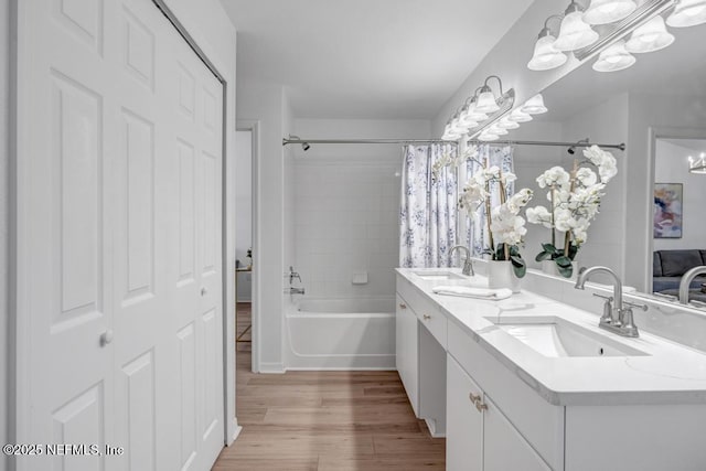 10961 Burnt Mill Rd Unit 1534, Jacksonville, FL 32256 - full bathroom with double vanity, shower / bath combination with curtain, wood finished floors, and a chandelier
