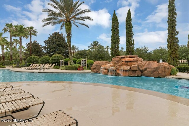 10961 Burnt Mill Rd Unit 1534, Jacksonville, FL 32256 - community pool with a patio area