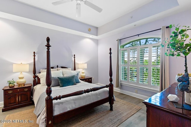 4300 S Beach Pkwy Unit 3313, Jacksonville Beach, FL 32250 - bedroom featuring baseboards, light wood-type flooring, and ceiling fan
