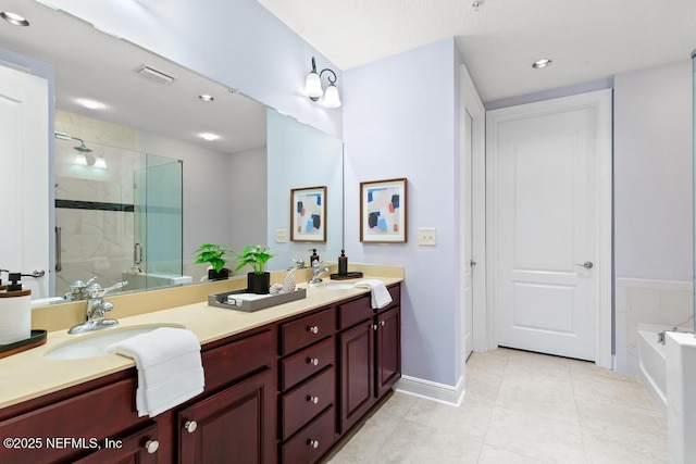 4300 S Beach Pkwy Unit 3313, Jacksonville Beach, FL 32250 - full bath with double vanity, a stall shower, a garden tub, tile patterned flooring, and baseboards