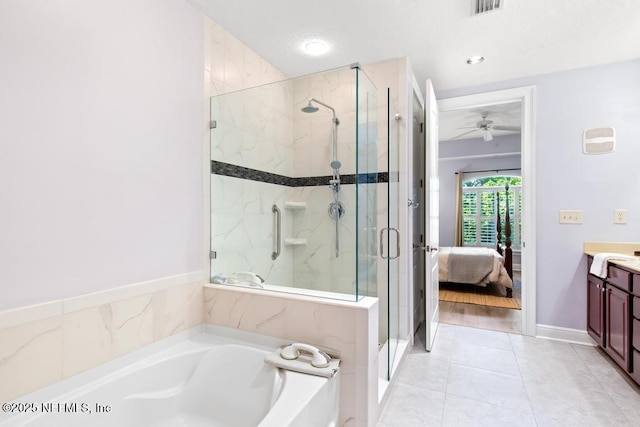 4300 S Beach Pkwy Unit 3313, Jacksonville Beach, FL 32250 - full bathroom featuring a marble finish shower, a garden tub, vanity, tile patterned floors, and ceiling fan