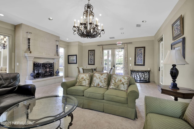 4300 S Beach Pkwy Unit 3313, Jacksonville Beach, FL 32250 - living room with a chandelier, french doors, recessed lighting, and a fireplace
