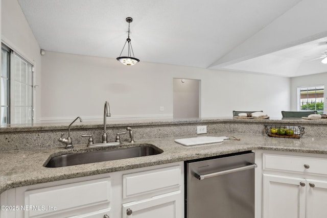 4458 Deep River Way E, Jacksonville, FL 32224 - kitchen featuring dishwasher, white cabinetry, decorative light fixtures, and light stone counters