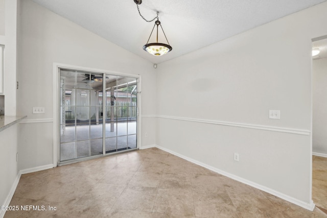 4458 Deep River Way E, Jacksonville, FL 32224 - spare room with lofted ceiling and baseboards