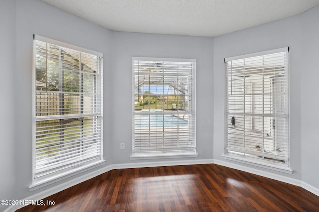 4458 Deep River Way E, Jacksonville, FL 32224 - unfurnished dining area featuring wood finished floors and baseboards