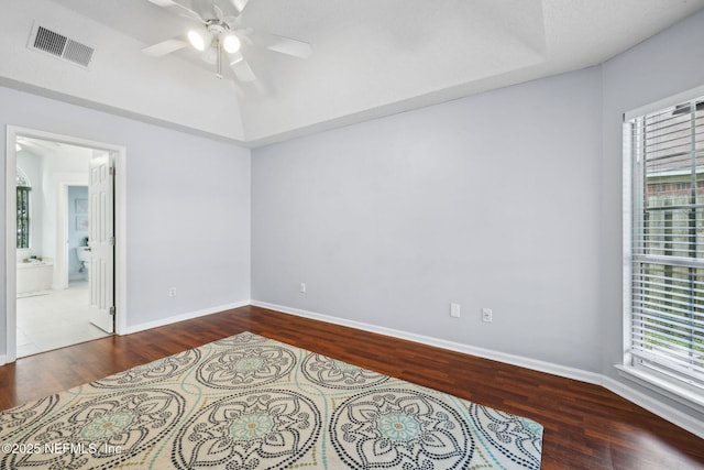 4458 Deep River Way E, Jacksonville, FL 32224 - unfurnished bedroom featuring wood finished floors, ceiling fan, and connected bathroom