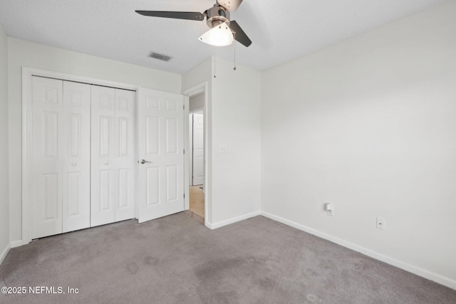 4458 Deep River Way E, Jacksonville, FL 32224 - unfurnished bedroom featuring carpet floors, a closet, and a ceiling fan