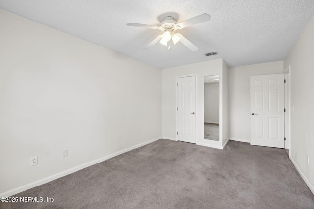 4458 Deep River Way E, Jacksonville, FL 32224 - unfurnished bedroom featuring carpet floors, a textured ceiling, and ceiling fan